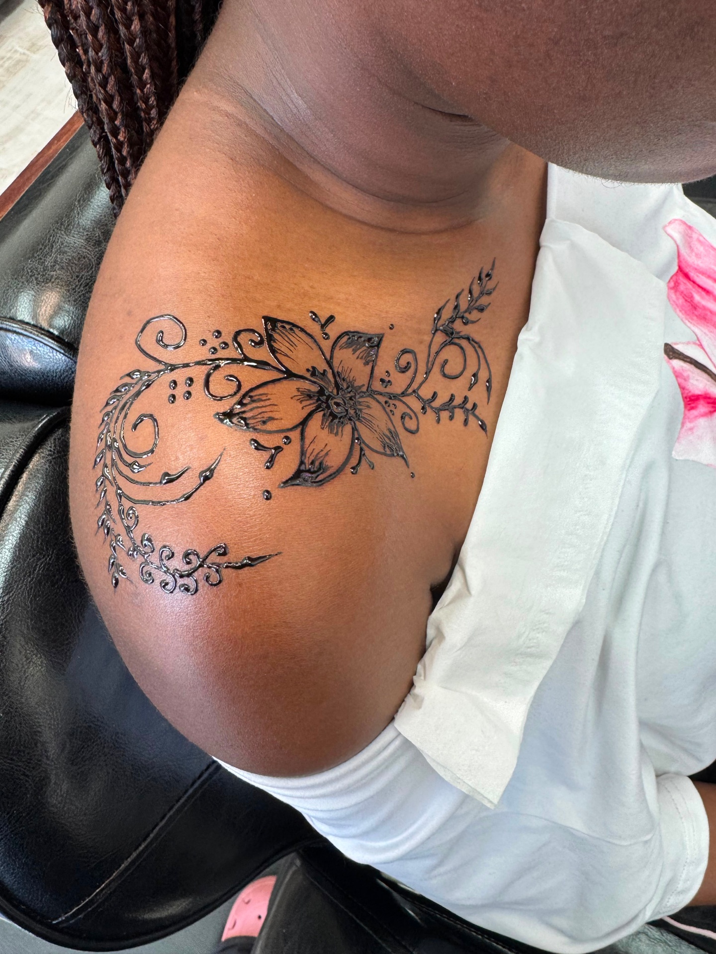 Shoulder henna tattoo with floral and vine design at Magical Waxing Atlanta henna studio